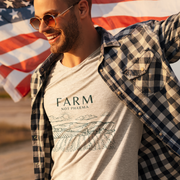 Grey short sleeve t-shirt with 'Farm Not Pharma' in bold green letters