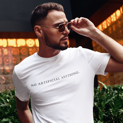 White short sleeve t-shirt with 'No Artificial Anything' in bold black letters